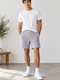 Male model in grey shorts